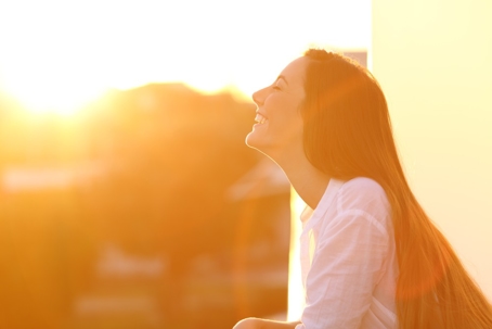 woman enjoying the sunset