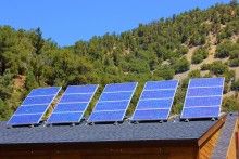 blue solar panels on roof