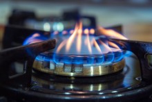 natural gas burner on stove up close