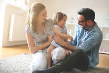 healthy and safe family indoors with baby