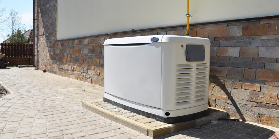 Generator installed outside a residential home for power backup