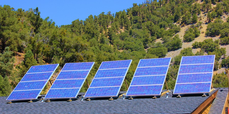 blue solar panels on roof