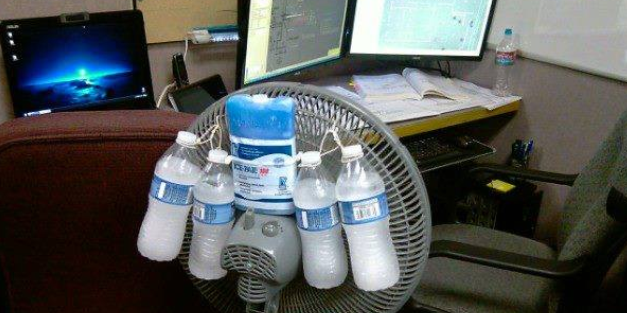 ice packs on fan in office